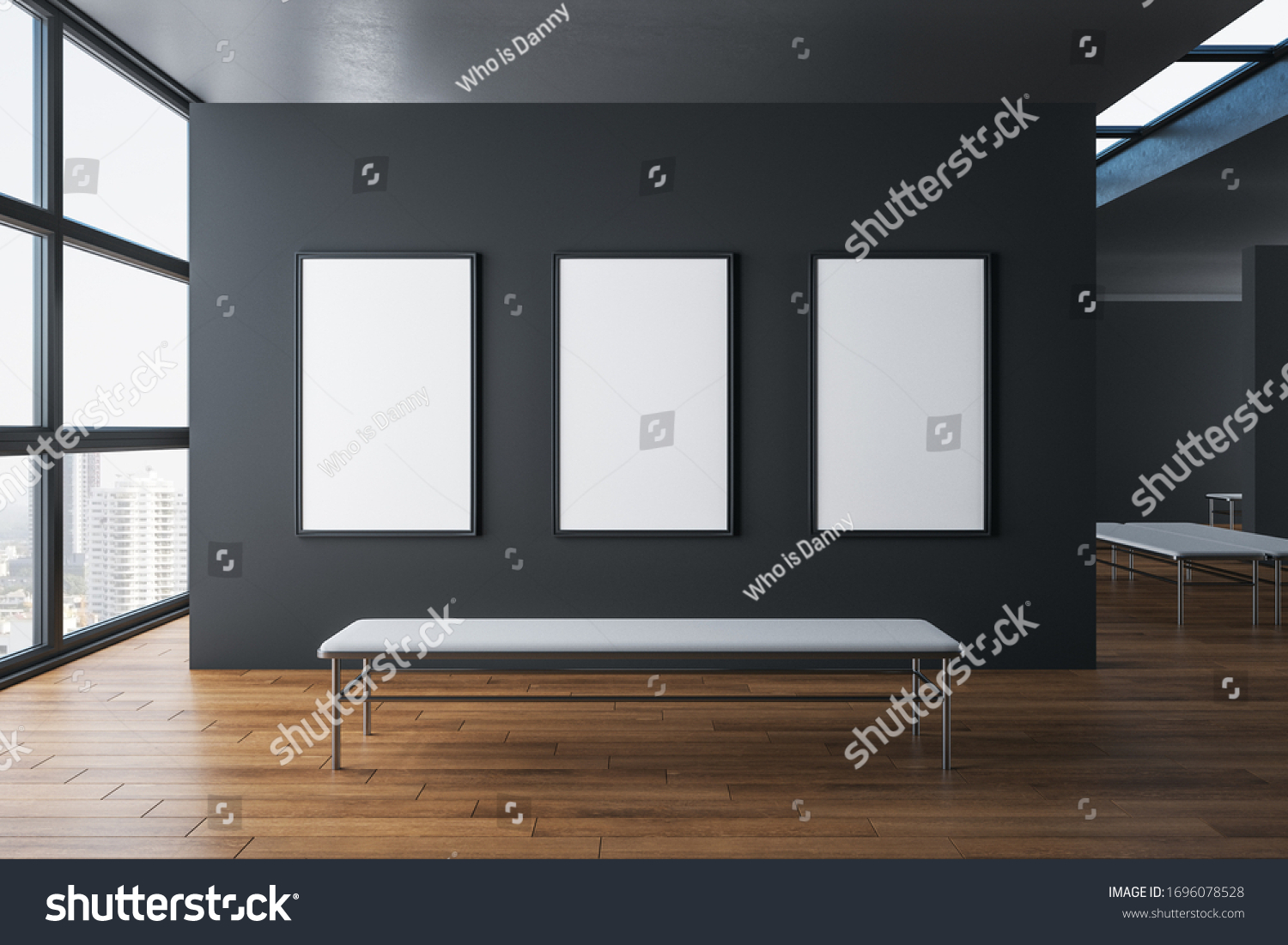 Contemporary exhibition hall interior with three empty poster on concrete wall wooden floor city view and daylight. Gallery concept. Mock up 3D Rendering