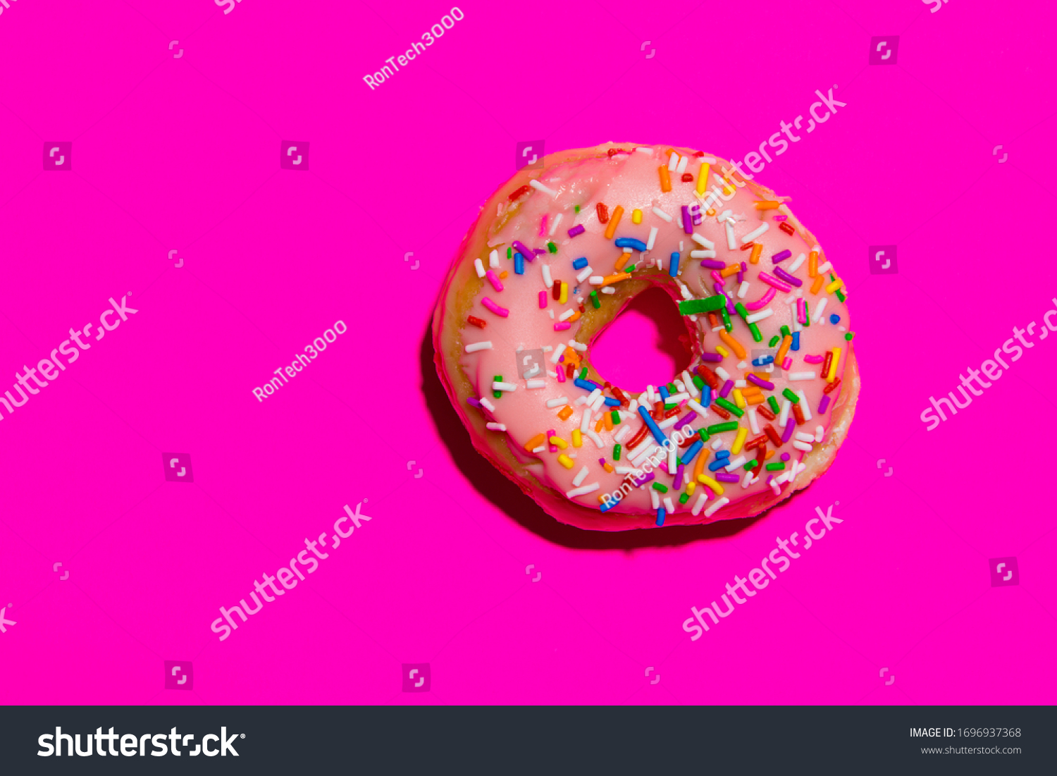 Sprinkle Donut on Hot Pink Background