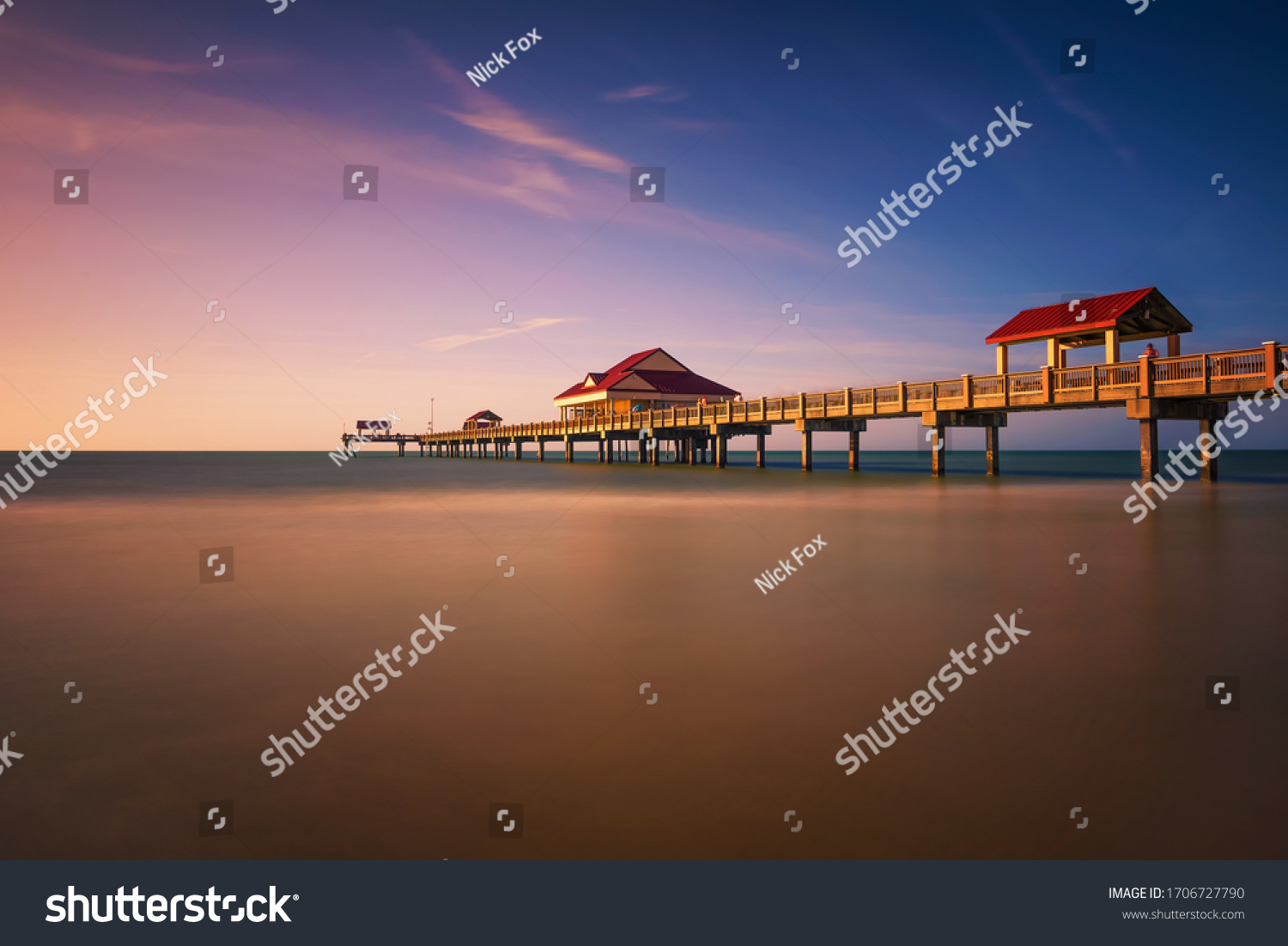 Pier 60 at sunset on a Clearwater Beach in Florida. Long exposure.