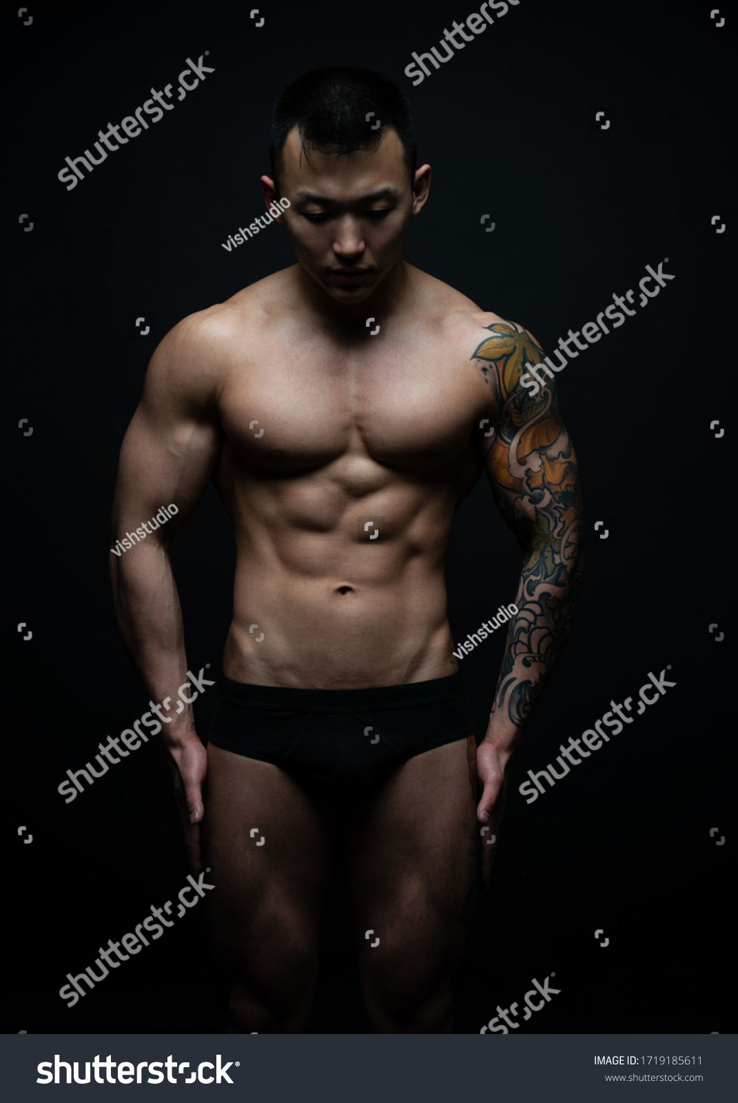 Muscled shirtless asian male model