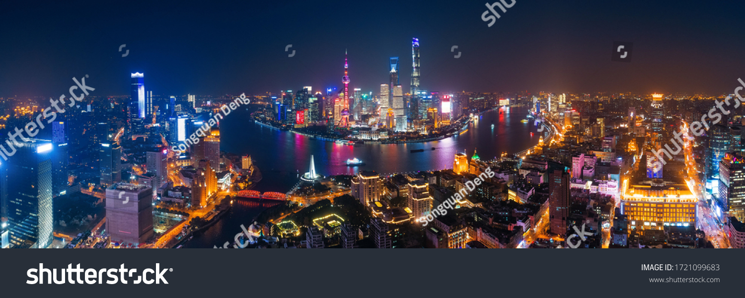 Shanghai Pudong aerial night view from above with city skyline and skyscrapers in China.