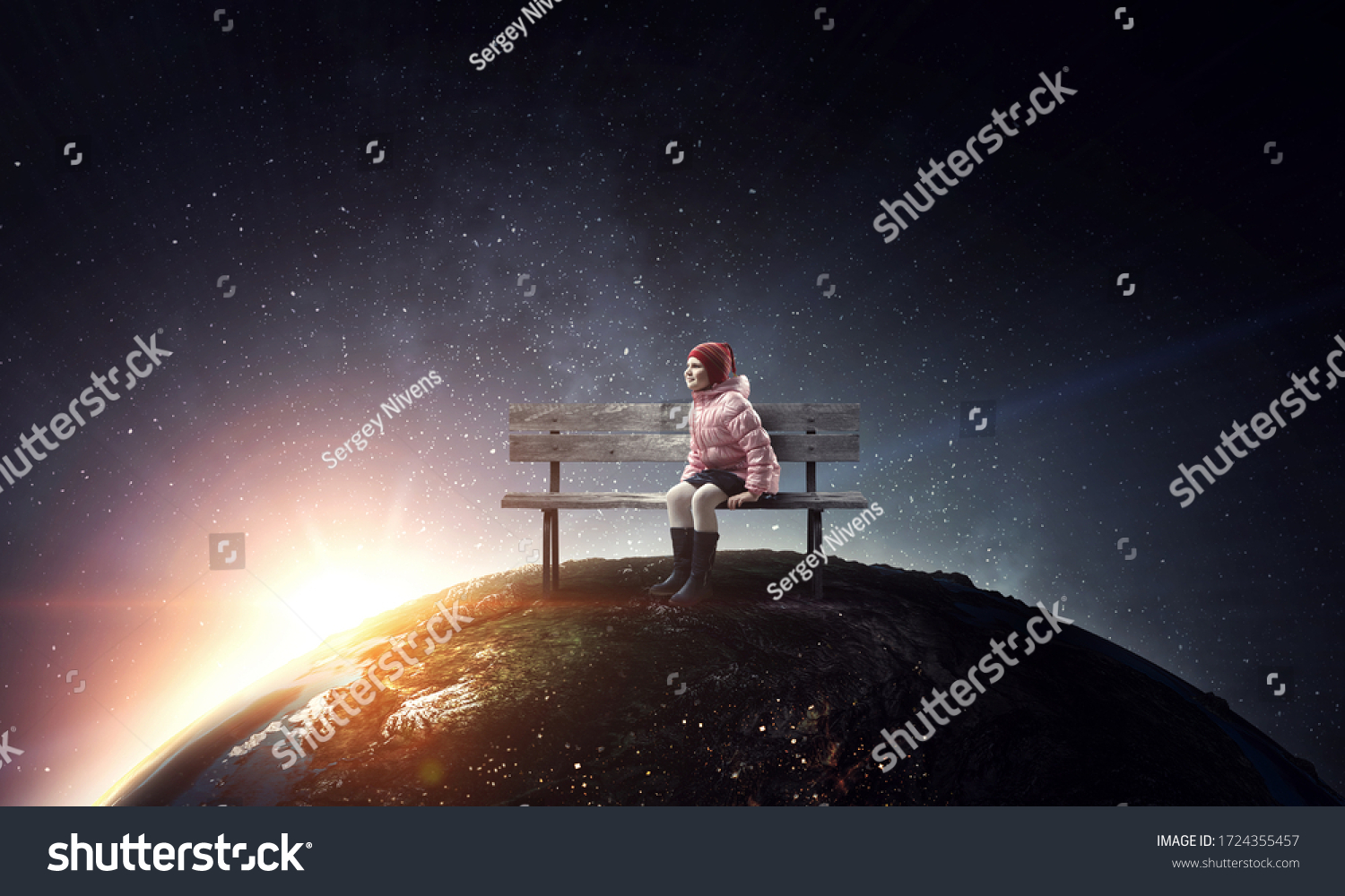 Dreamy little girl sitting ready for adventure