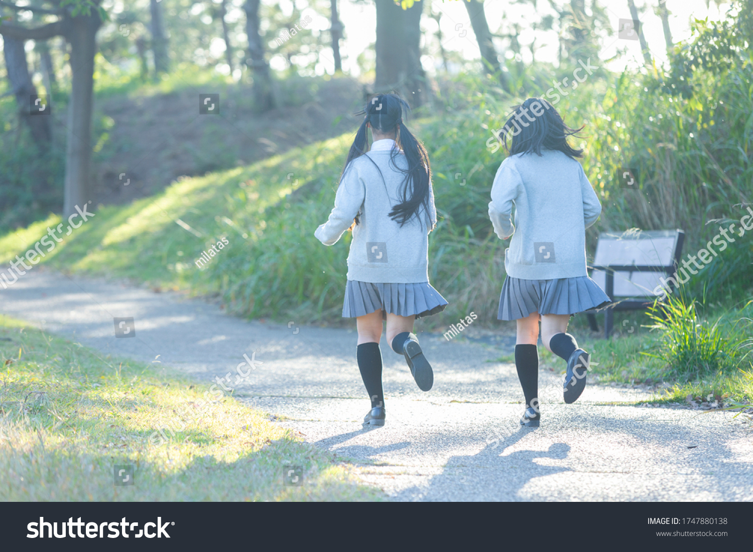 High school girl running in the park