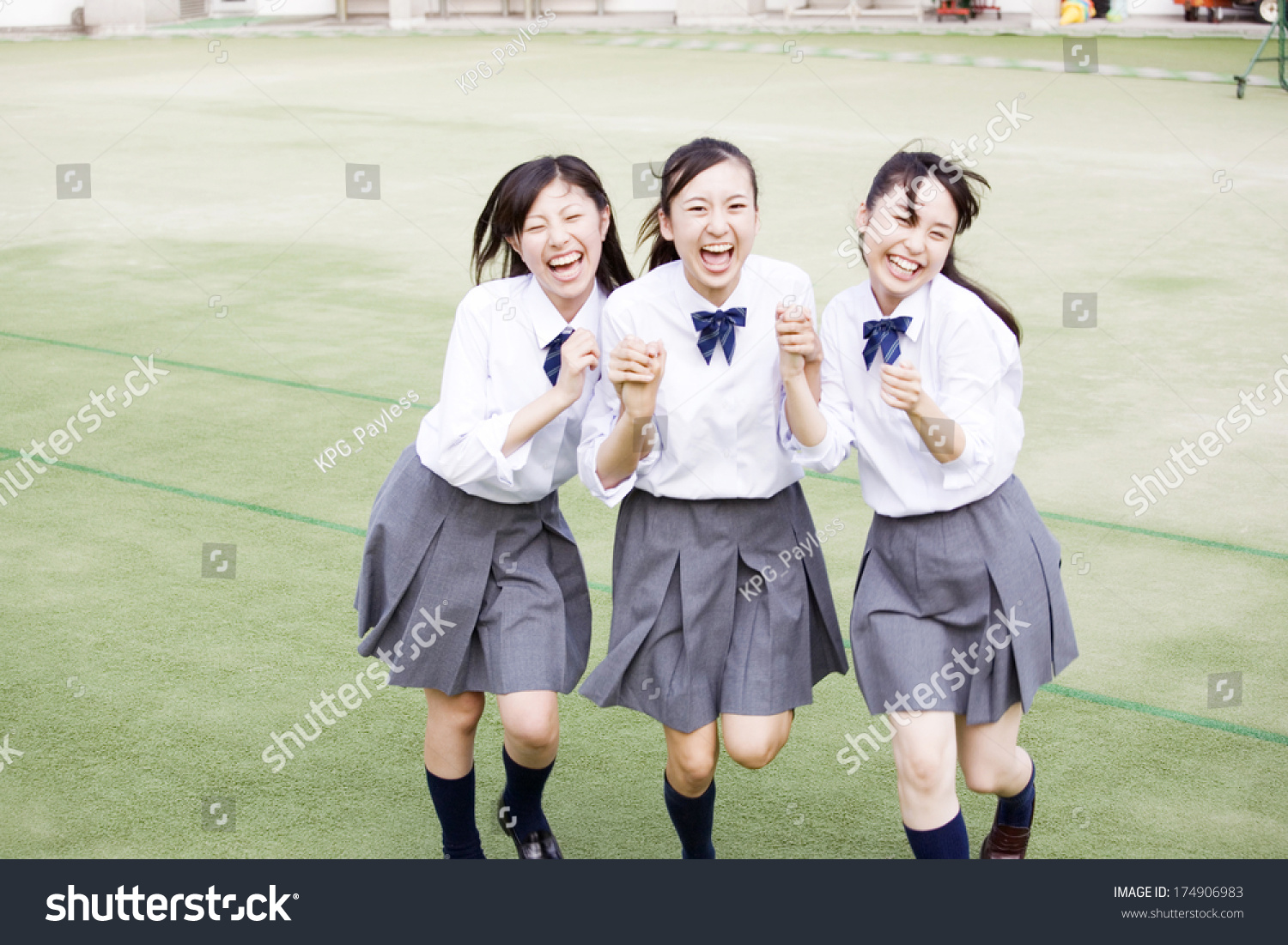 female Japanese students laughing together