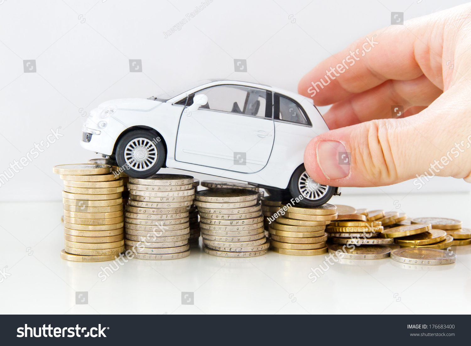 Car with helping hand on coins