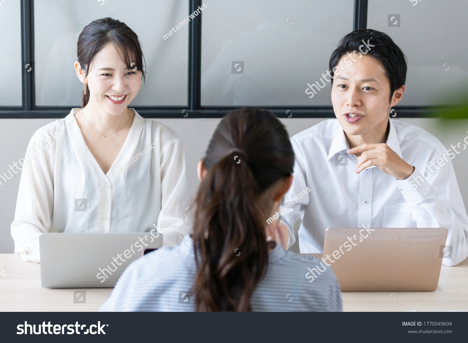Group of people working in the office. Teamwork of business.