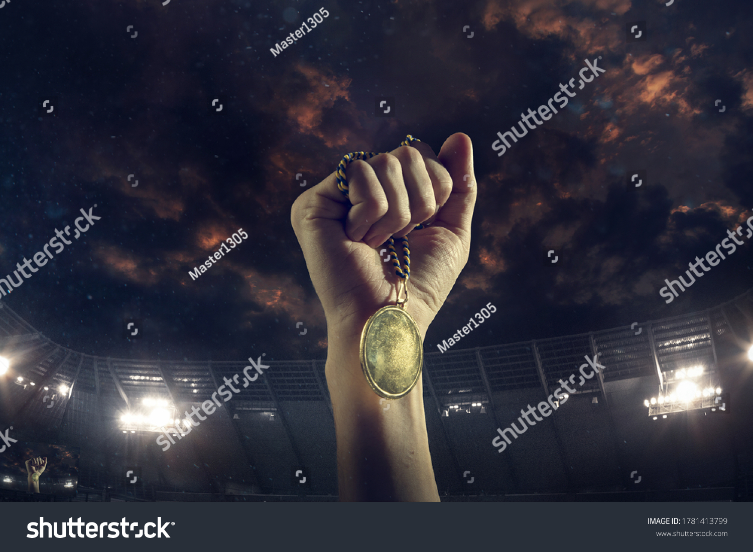 Champion. Award of victory  male hands tightening the golden medal of winners against cloudy dark sky. Sport  competition  championship  winning  achieving the goal. Prize for success and honor.