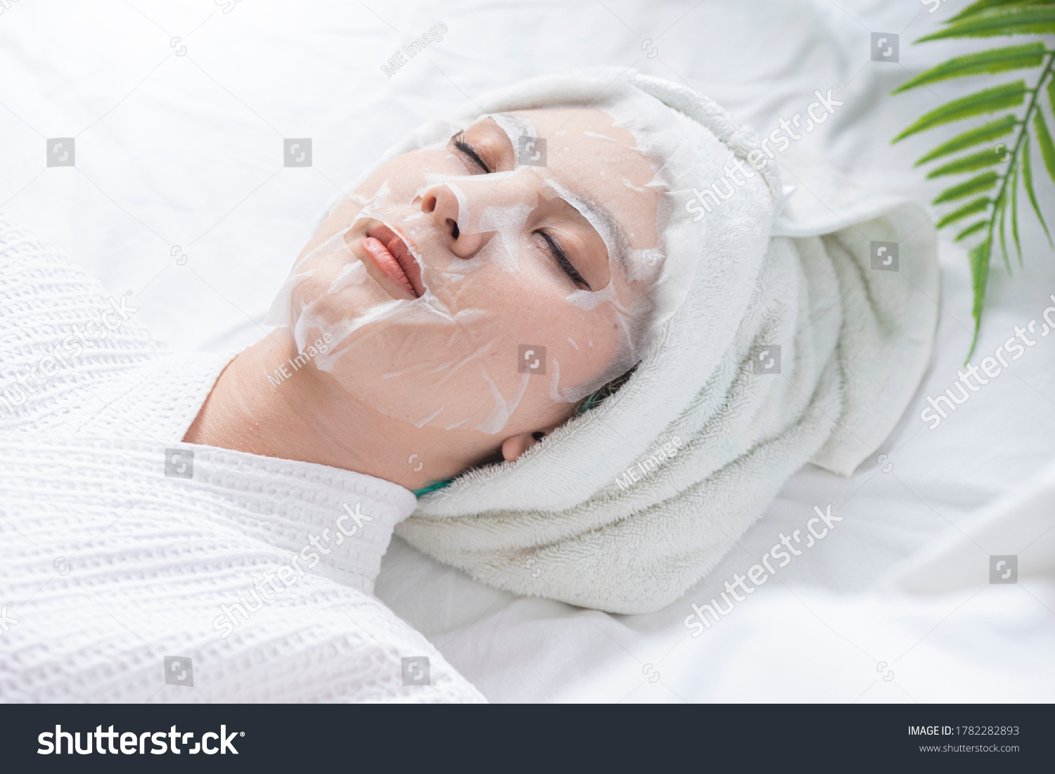 Beautiful woman in the spa salon Treatment hyperpigmentation and melasma on face by serum mask Facial rejuvenation procedure.