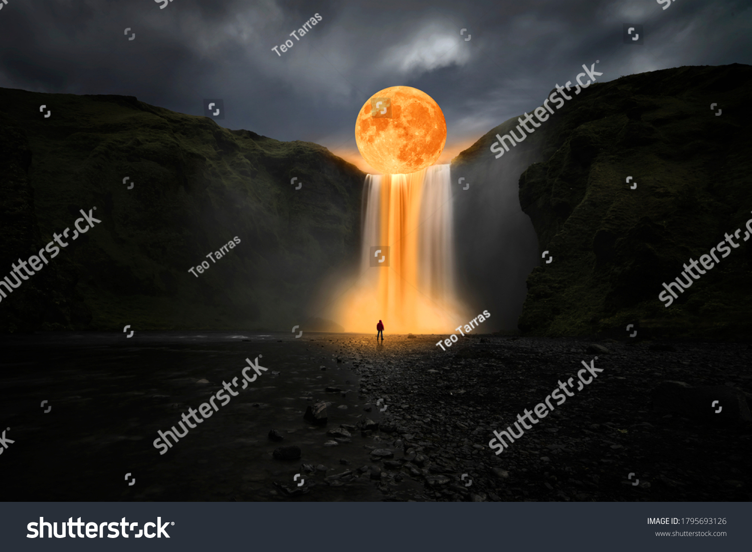 Orange moon over great waterfall