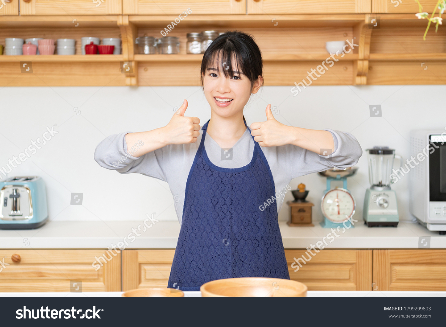 Young woman posing like in the studio shot