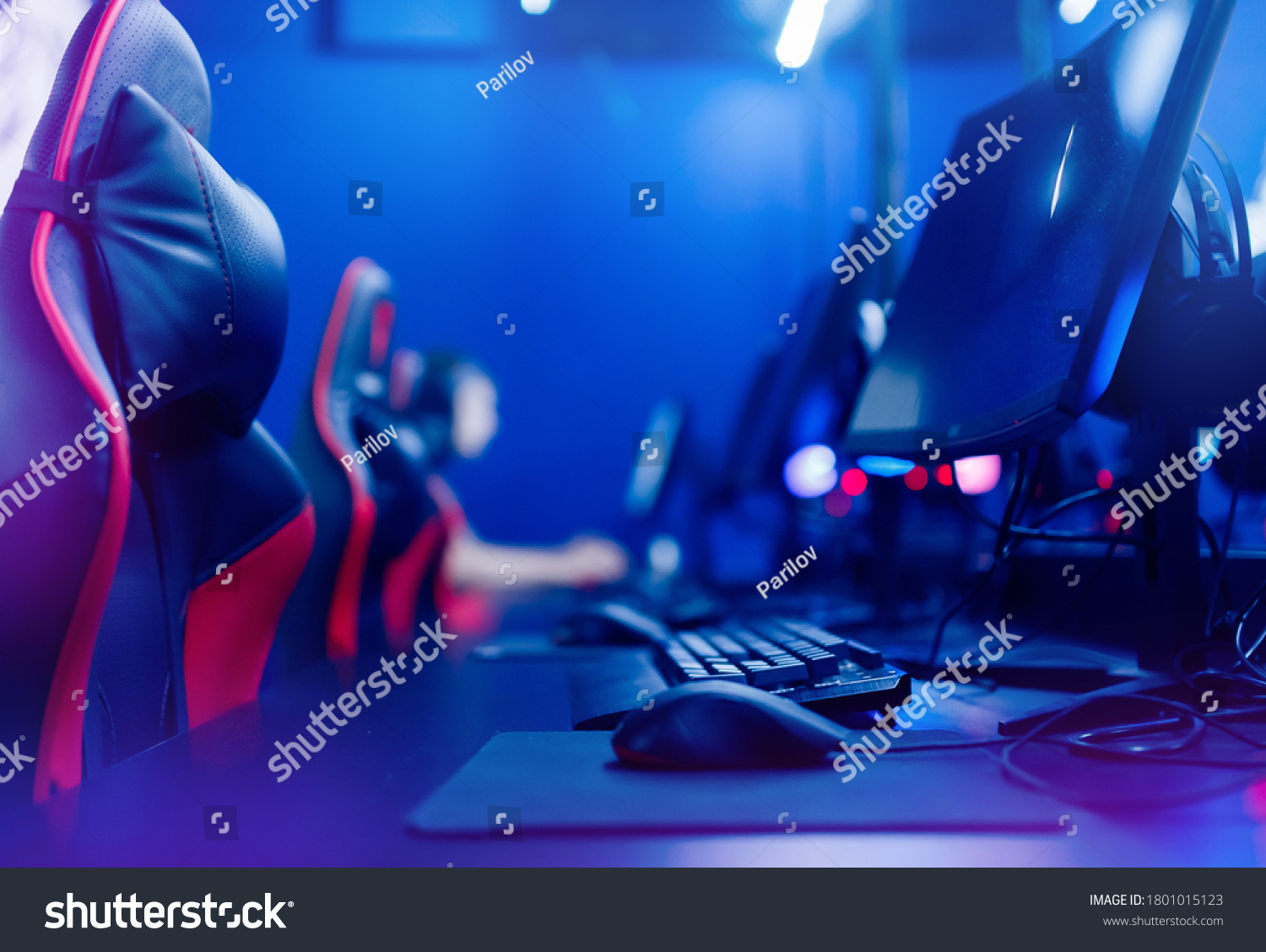 Professional gamers cafe room with powerful personal computer game chair blue color. Concept cyber sport arena.