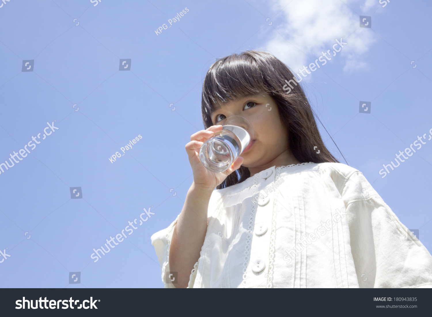 Japanese girl drinking a glass of water