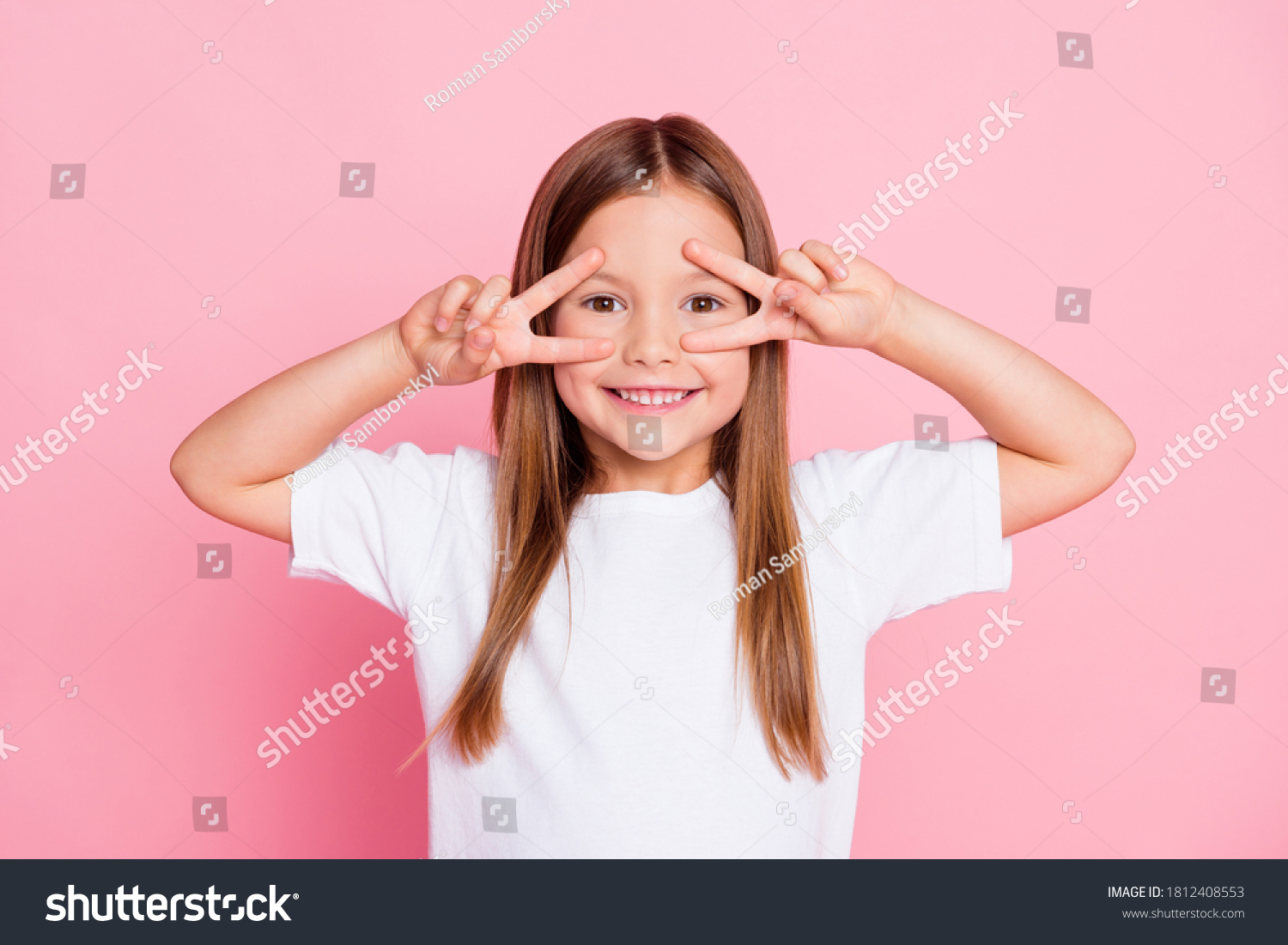 Photo of nice adorable pretty kid enjoy spring free time make v-sign wear good look clothes isolated over pink color background