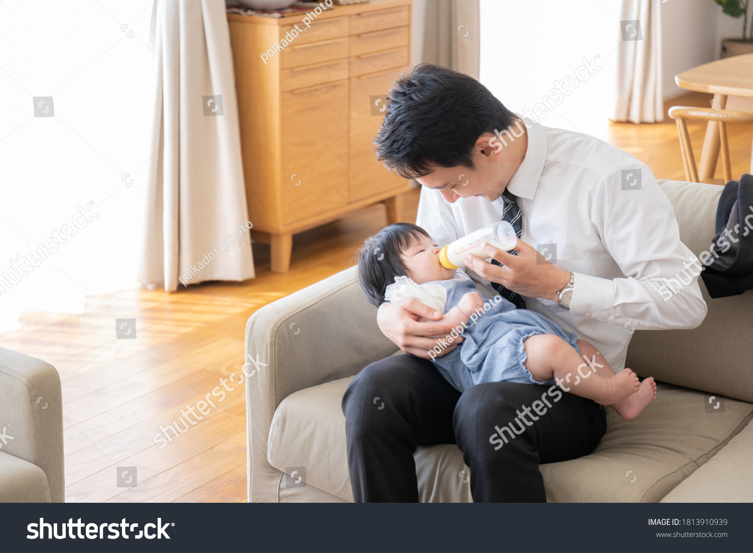 Father and baby in the living room