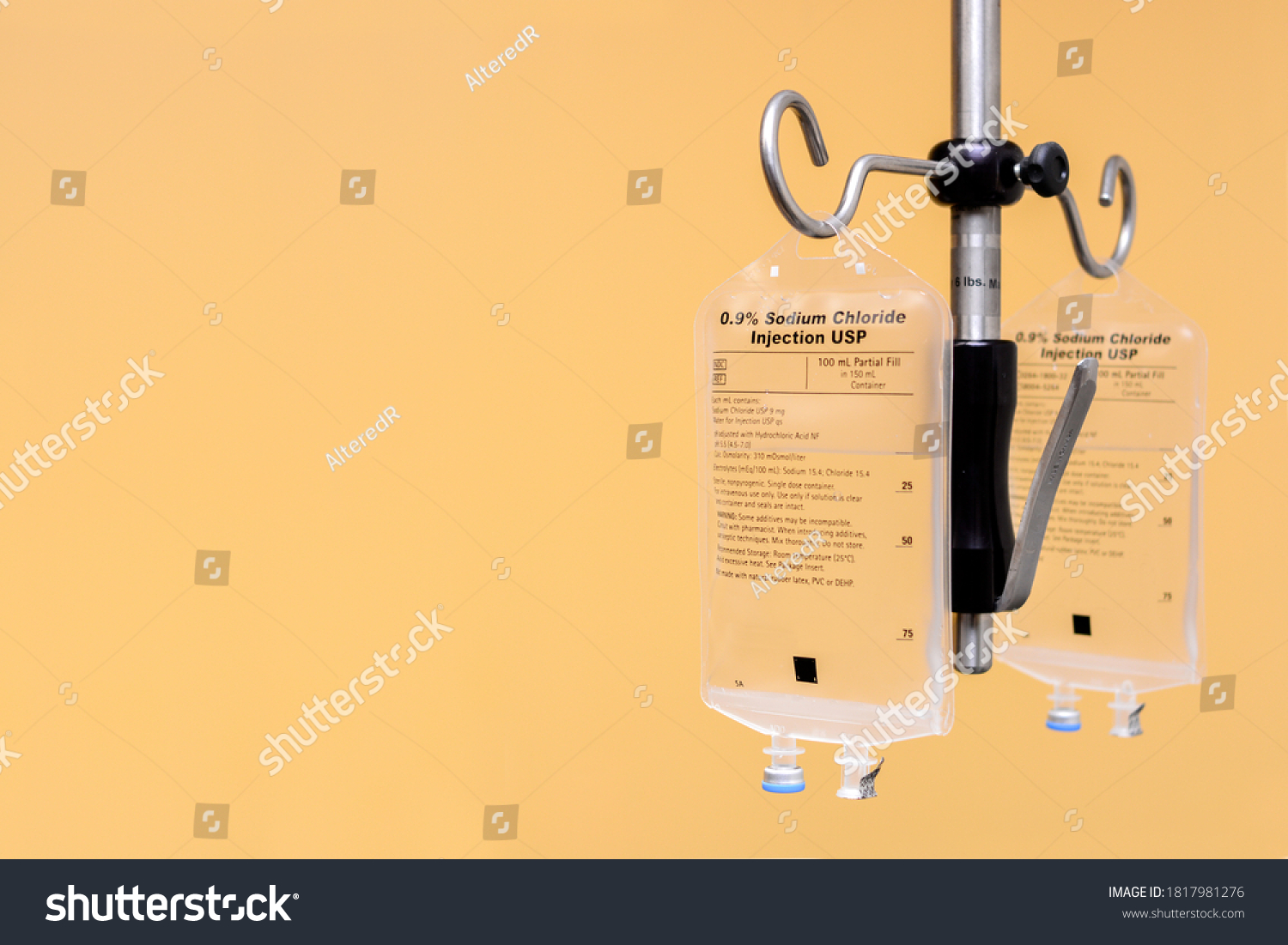 Two Saline IV Bags Hanging from IV Pole