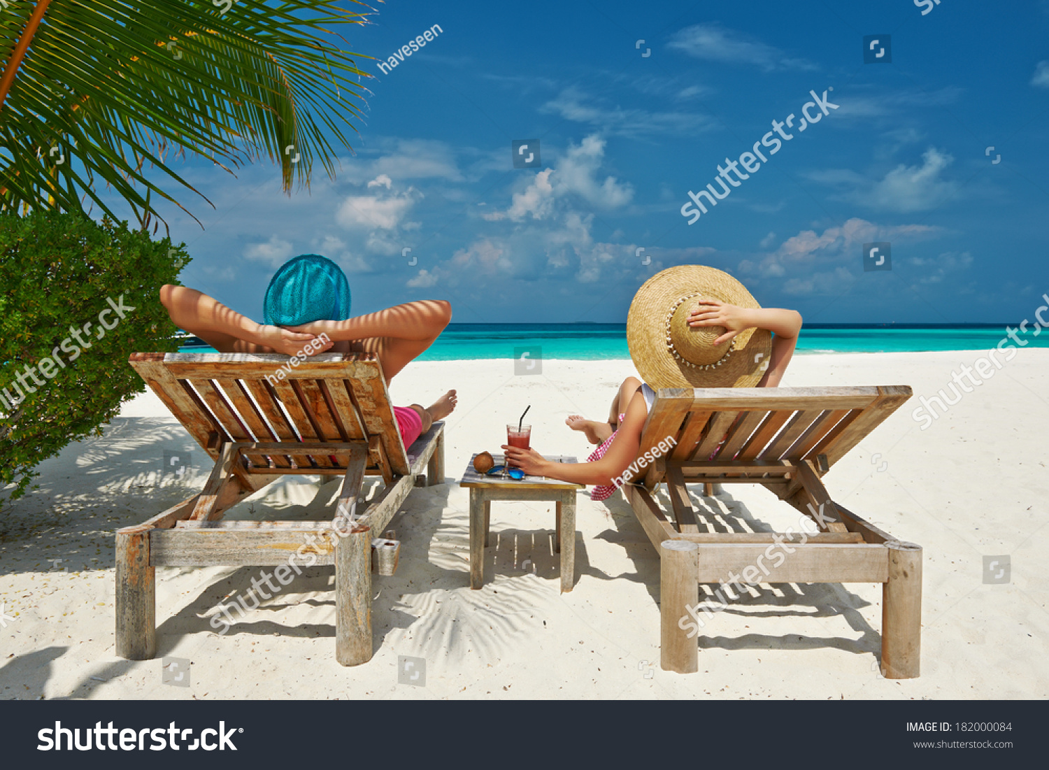 Couple on a tropical beach at Maldives