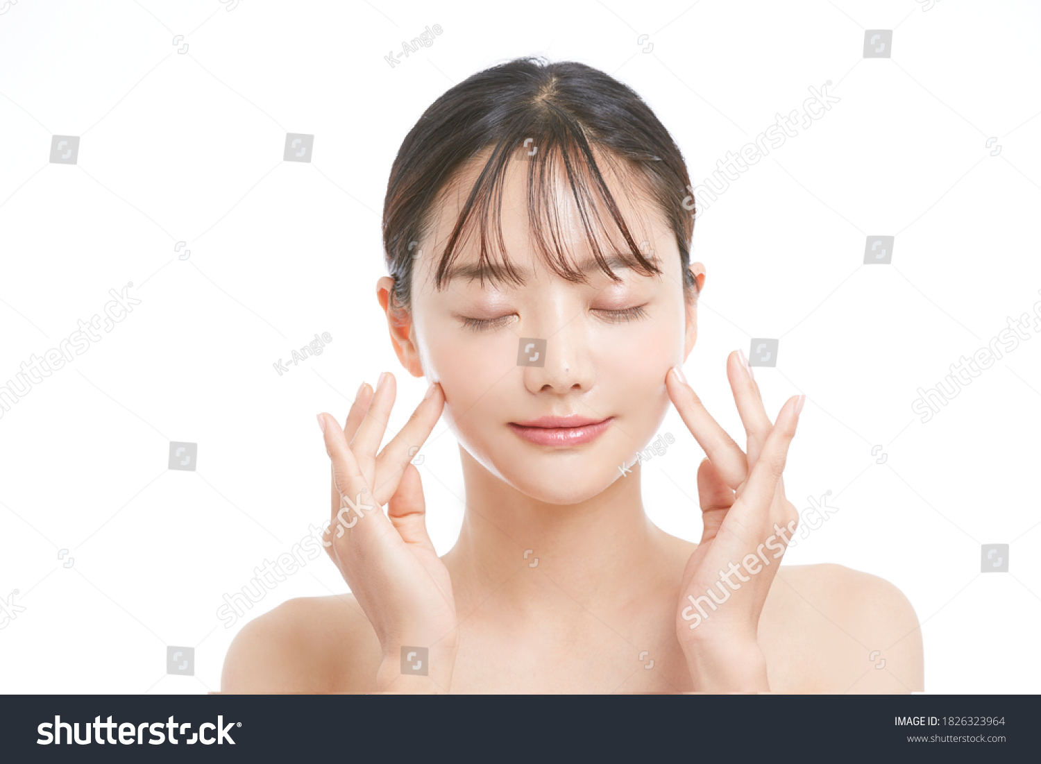 Beauty portrait of young Asian woman on white background