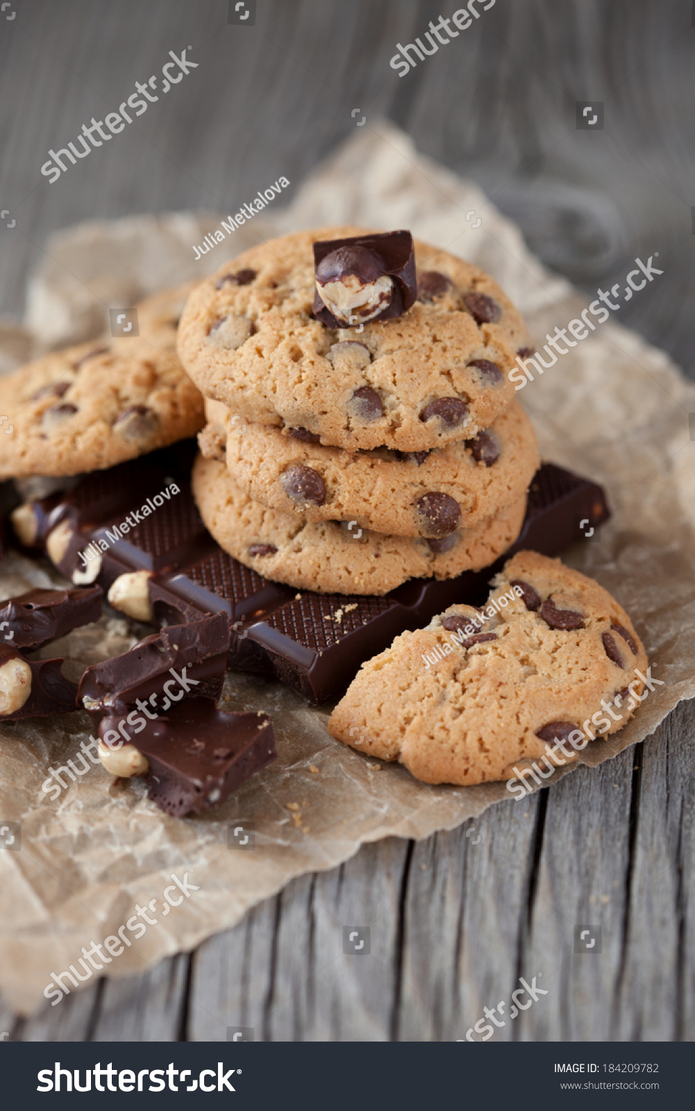 Homemade chocolate chip cookies on old wooden background  selective focus