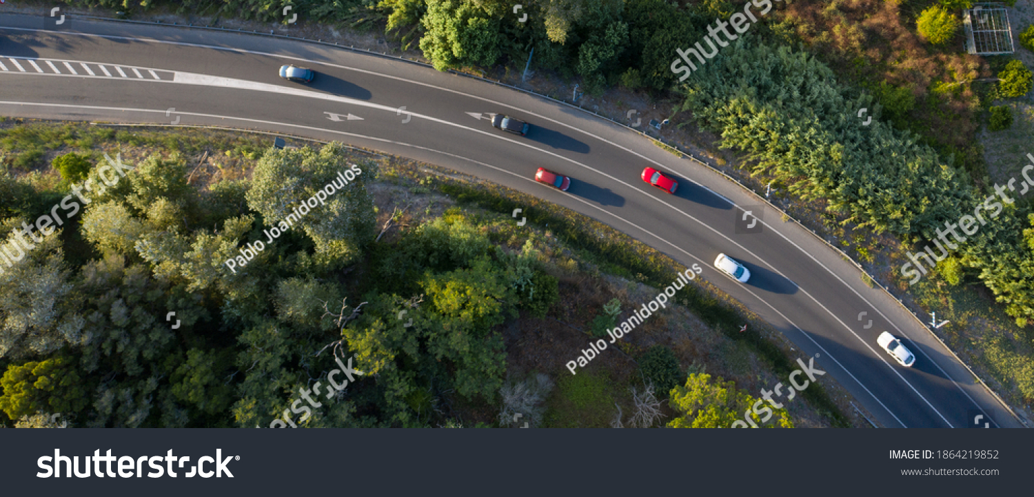 Traffic on a spanish road with cars driving seen from above aerial view	