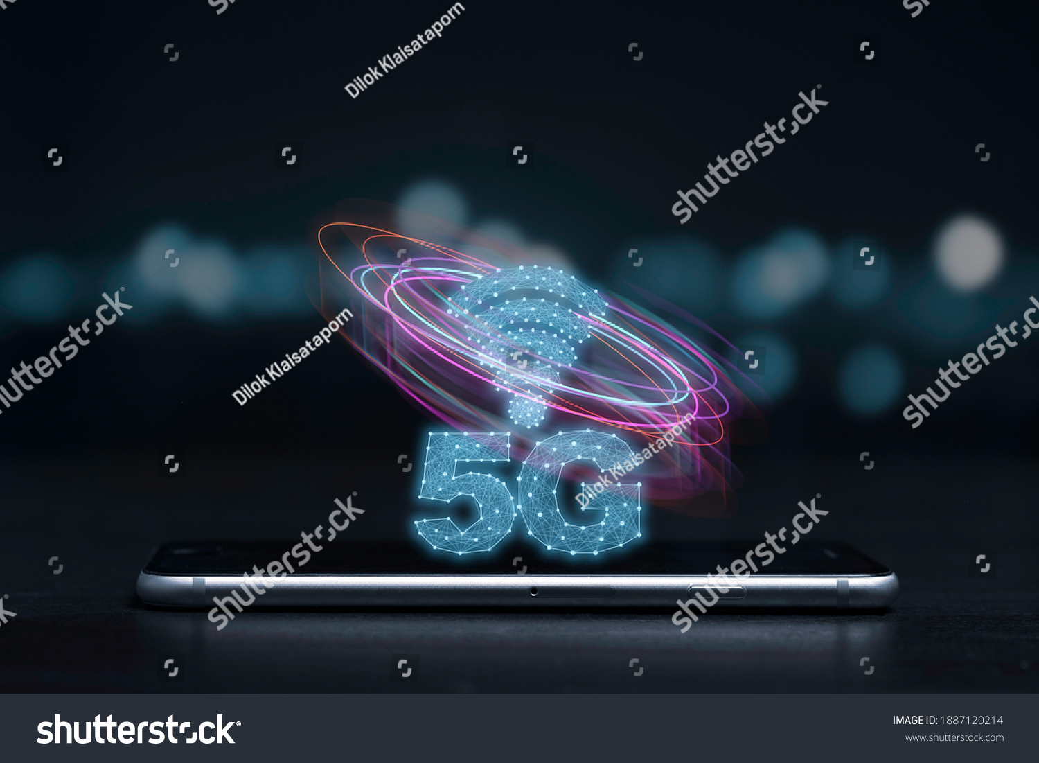 5G and internet of things or IOT concept 5G and internet sign with virtual effect on smartphone. IOT is high technology which every device will connect and control by 5G high speed internet.