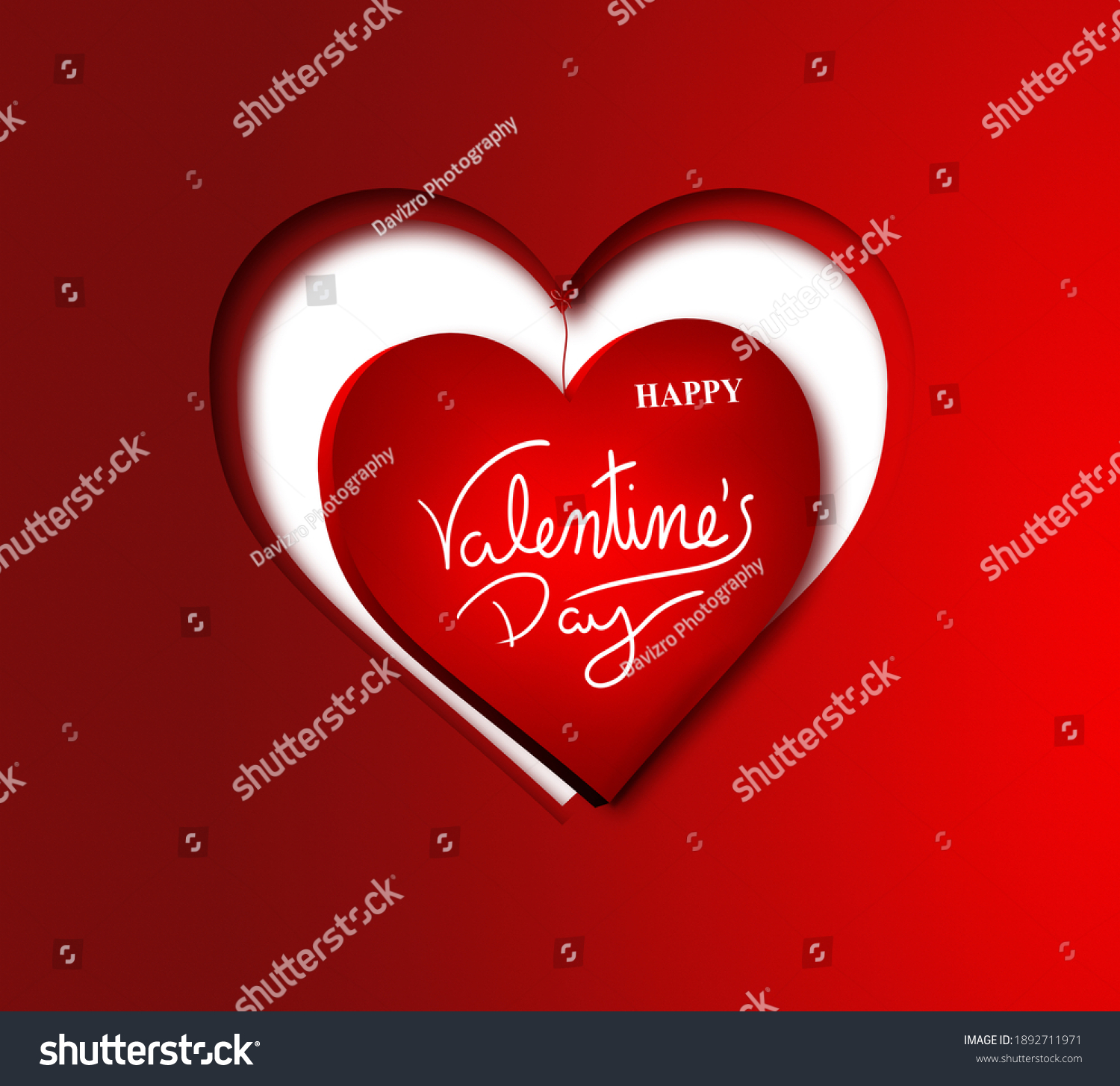 two cutouts of hearts on a red base placed concentrically with