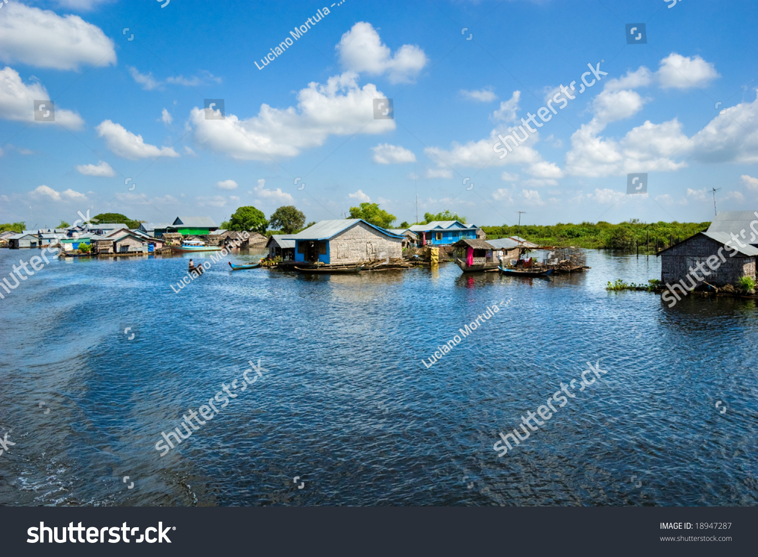Floating House and Houseboat on the Tonle Sap lake between Battambang and Siem reap. Cambodia.