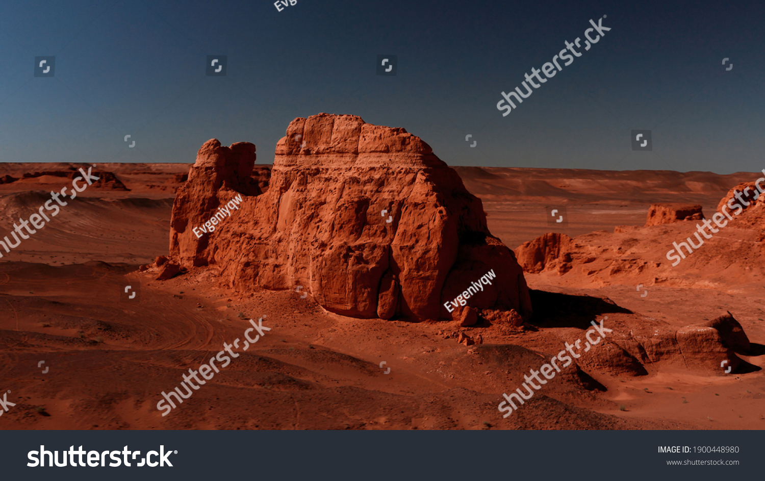 Martian landscape  Flaming Cliffs aerial view in the Gobi Desert. Scorched earth where the remains of dinosaurs rest  and the layings of their eggs. Mongolia. Canyon Herman-Tsav.