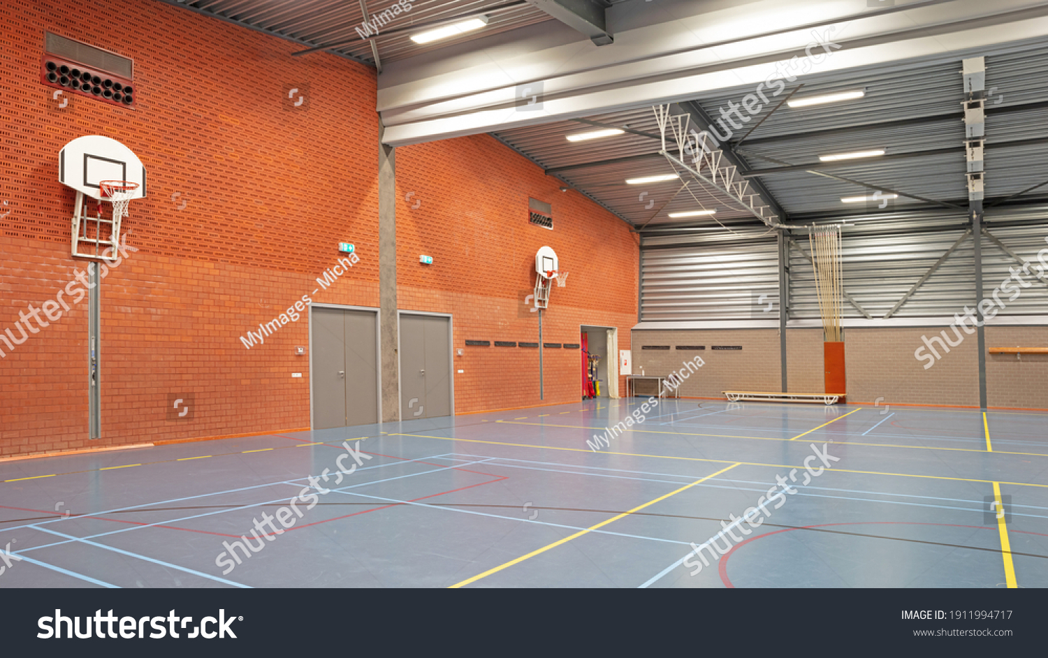 Interior of a large school gym hall  no children