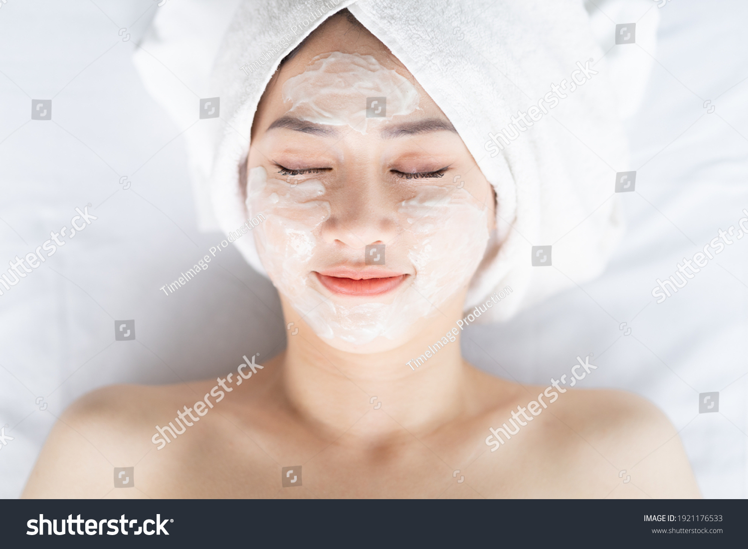Asian woman doing beauty treatments  spa treatments and being applied cream to her face