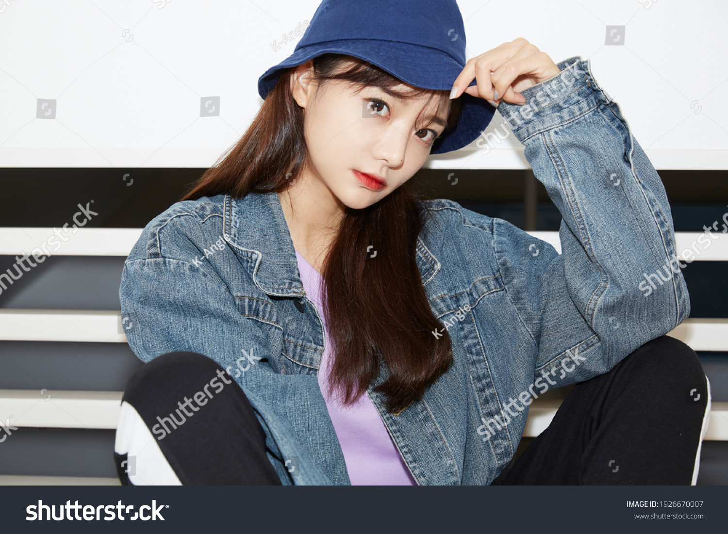 Portrait of a Asian young woman wearing street fashion