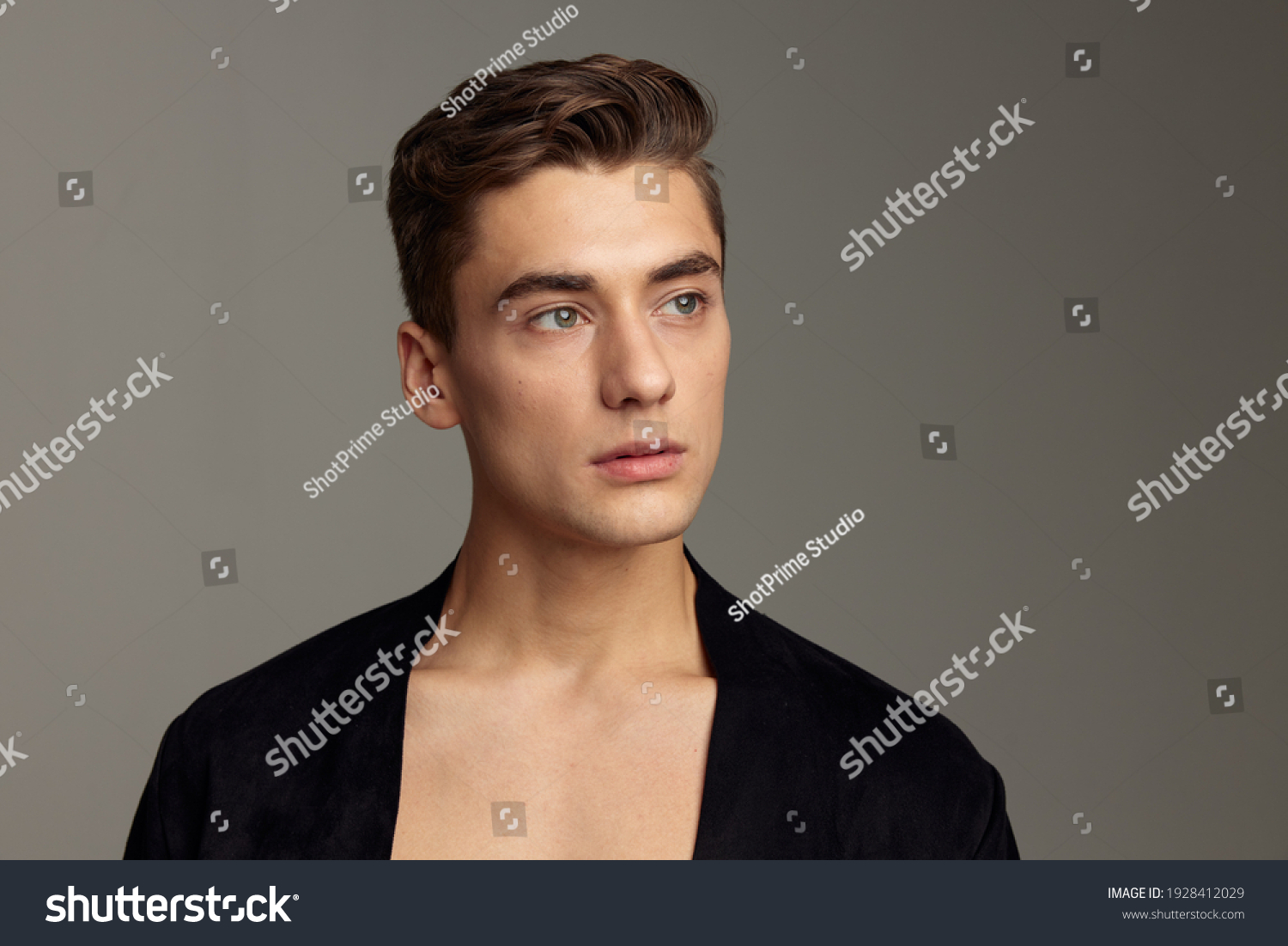 handsome man black jacket fashion hairstyle close-up attractive look model
