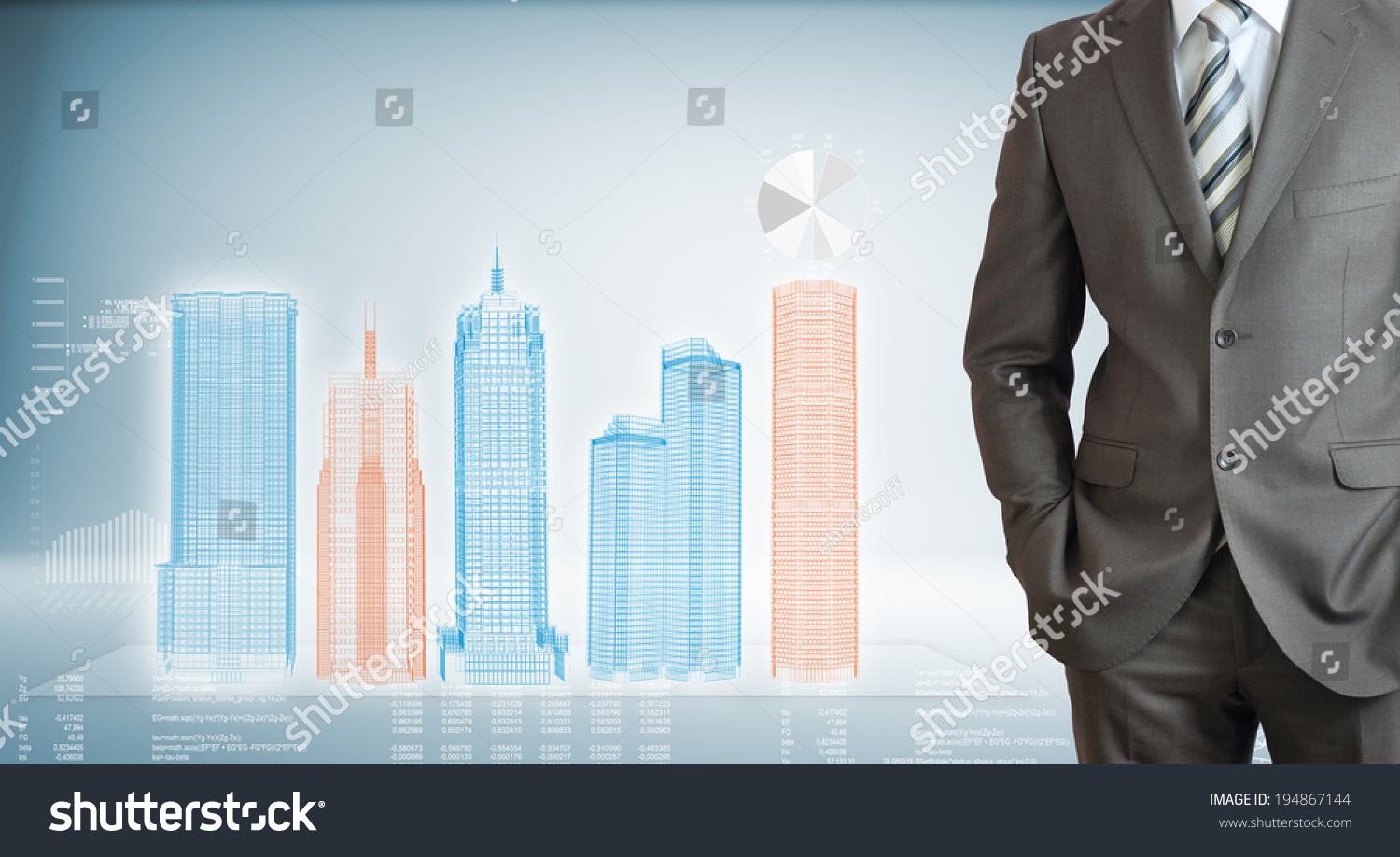 businessman standing with hands in pockets