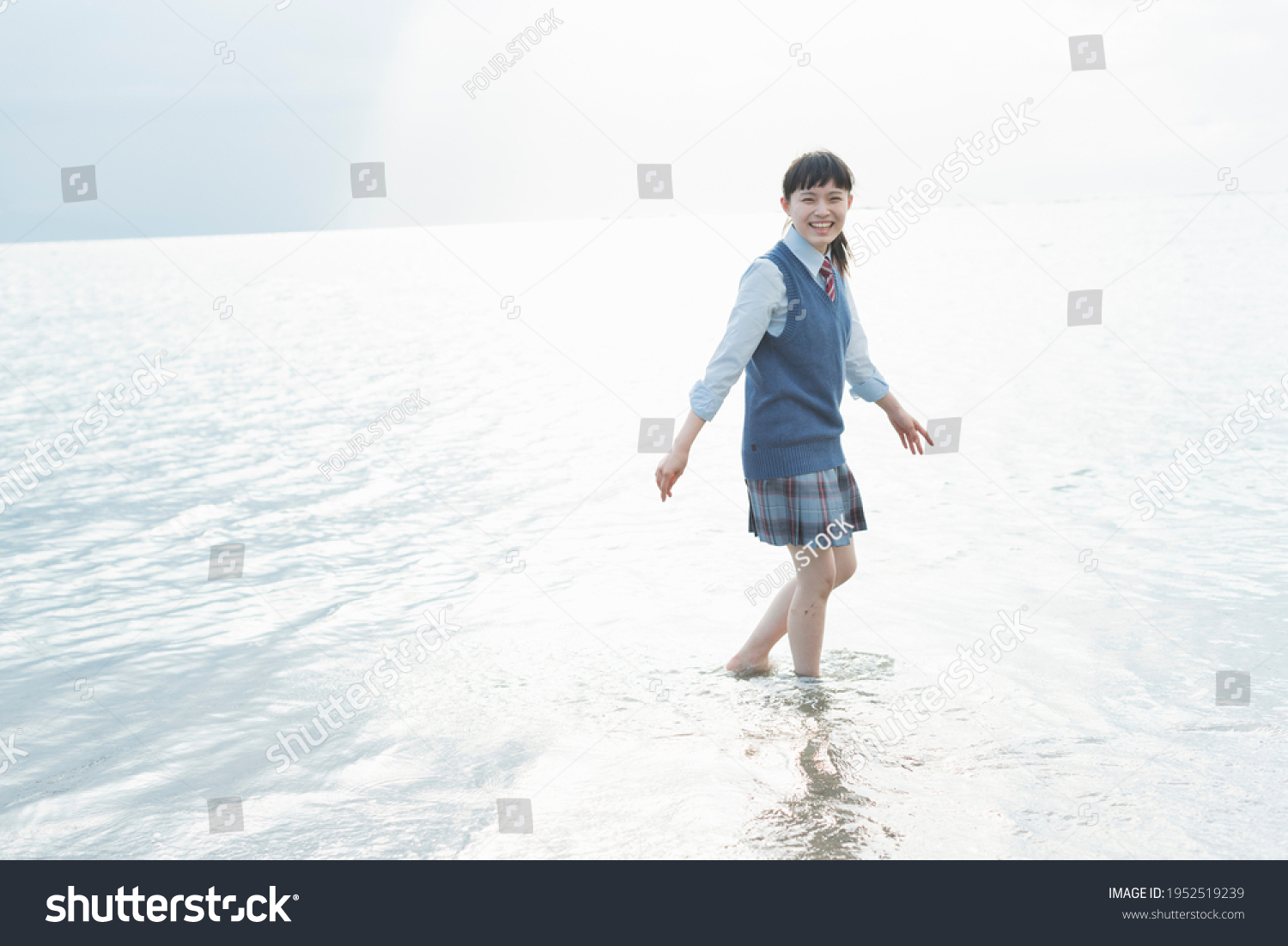 High School Girls Playing in the Sea