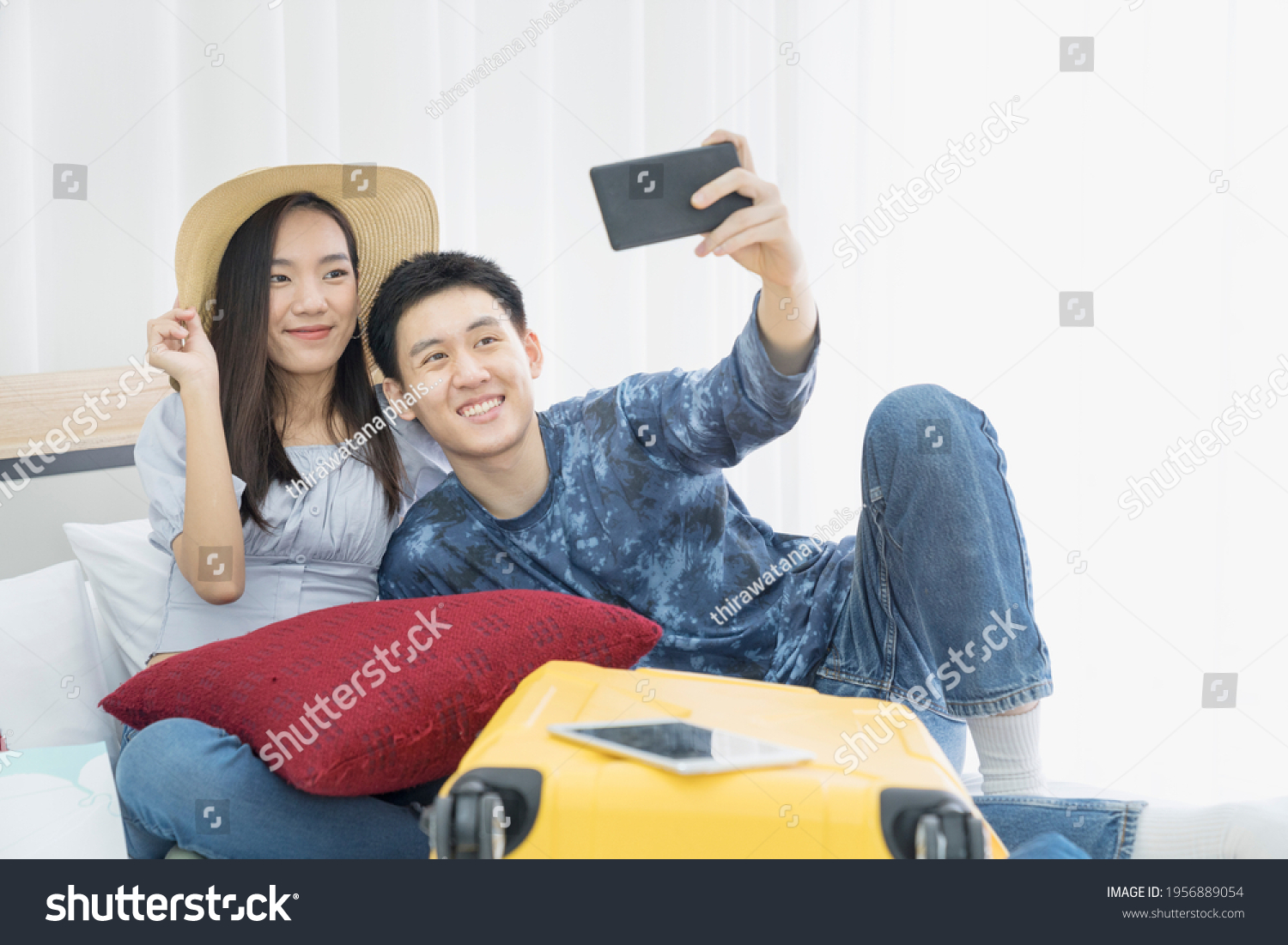 Asian couple travel. Young Couple selfie happy and go on the travel. 