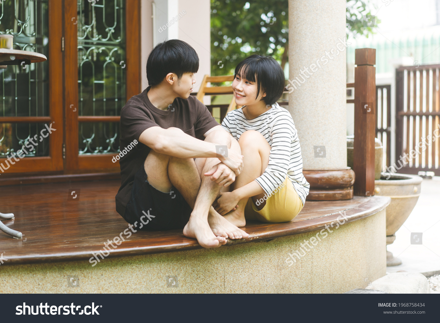 Young adult asian lover couple together living at home concept. Sitting ...