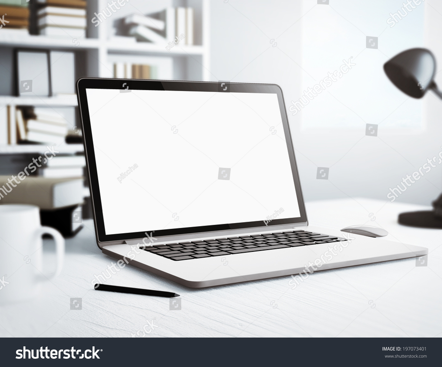 Laptop in white room
