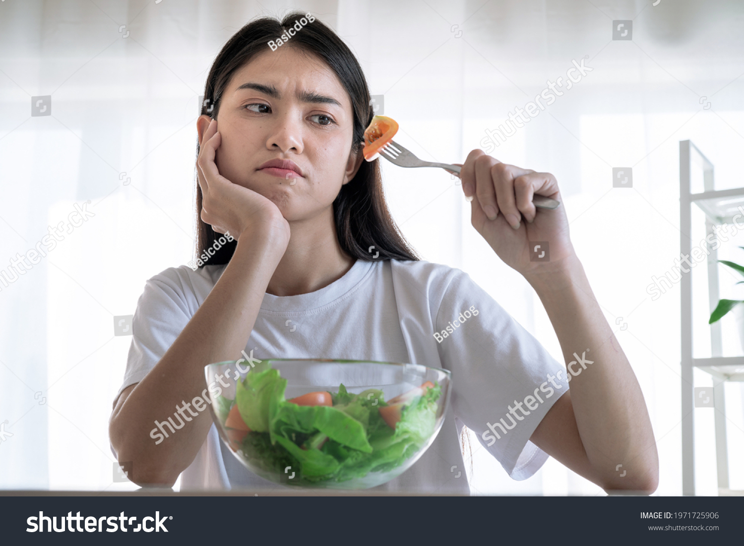 Asian woman feel anorexia  The girl does not like to eat vegetables  Healthy food.