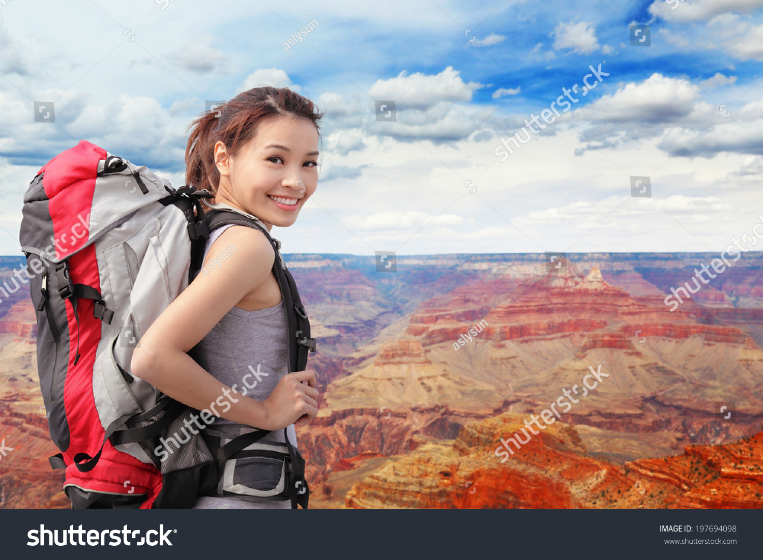Woman mountain Hiker with backpack enjoy view in grand canyon  asian