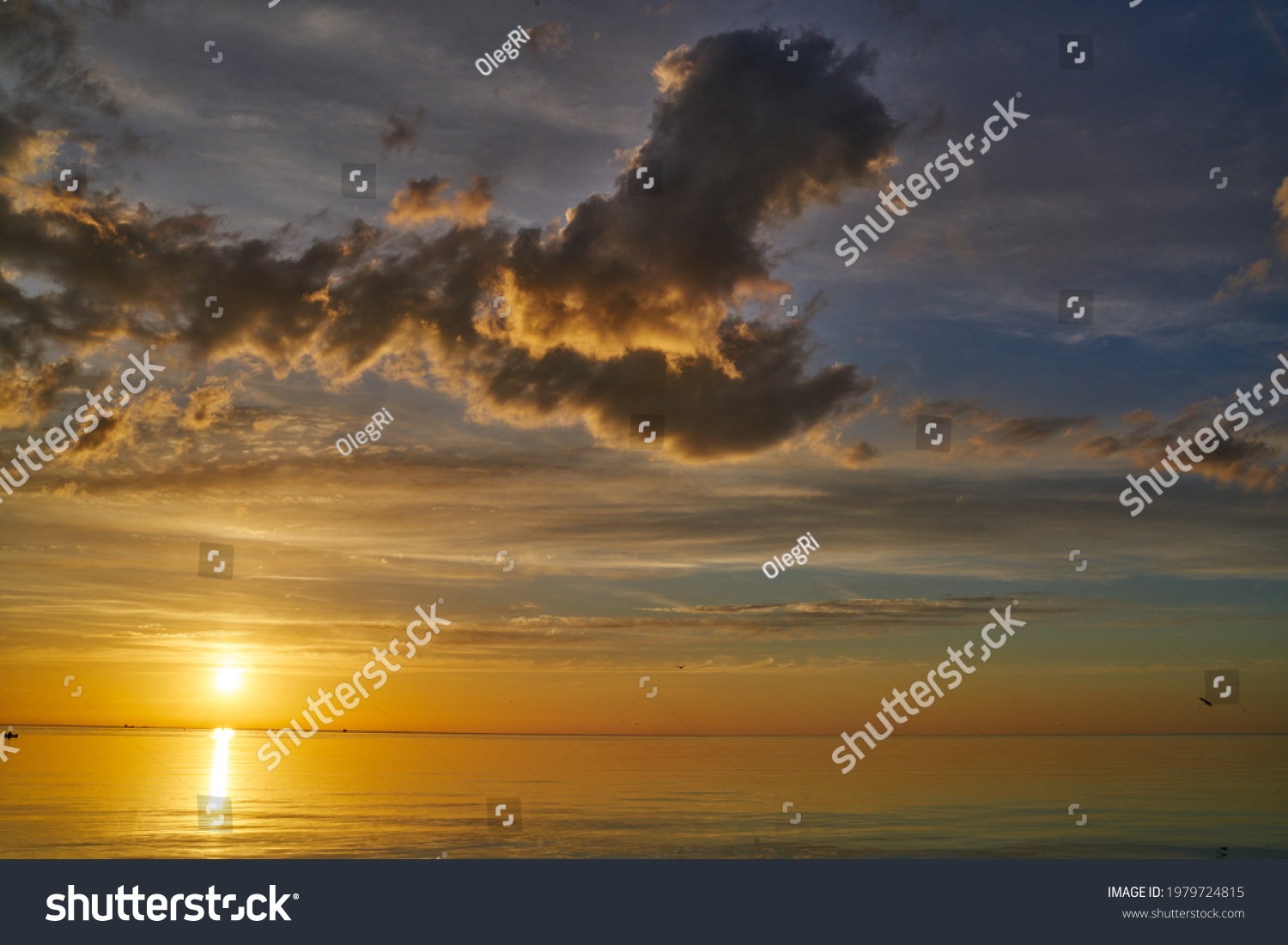 Evening sky with dramatic clouds over the sea. Dramatic sunset over the ...