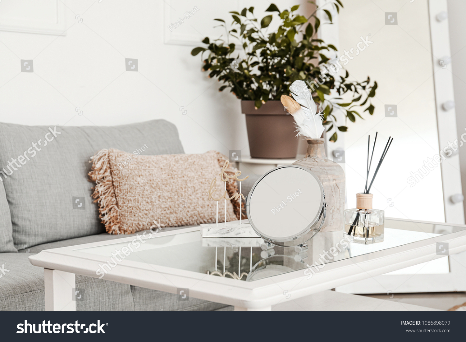 Mirror and reed diffuser on table in modern living room_站酷海洛_正版图片_视频_字体 ...