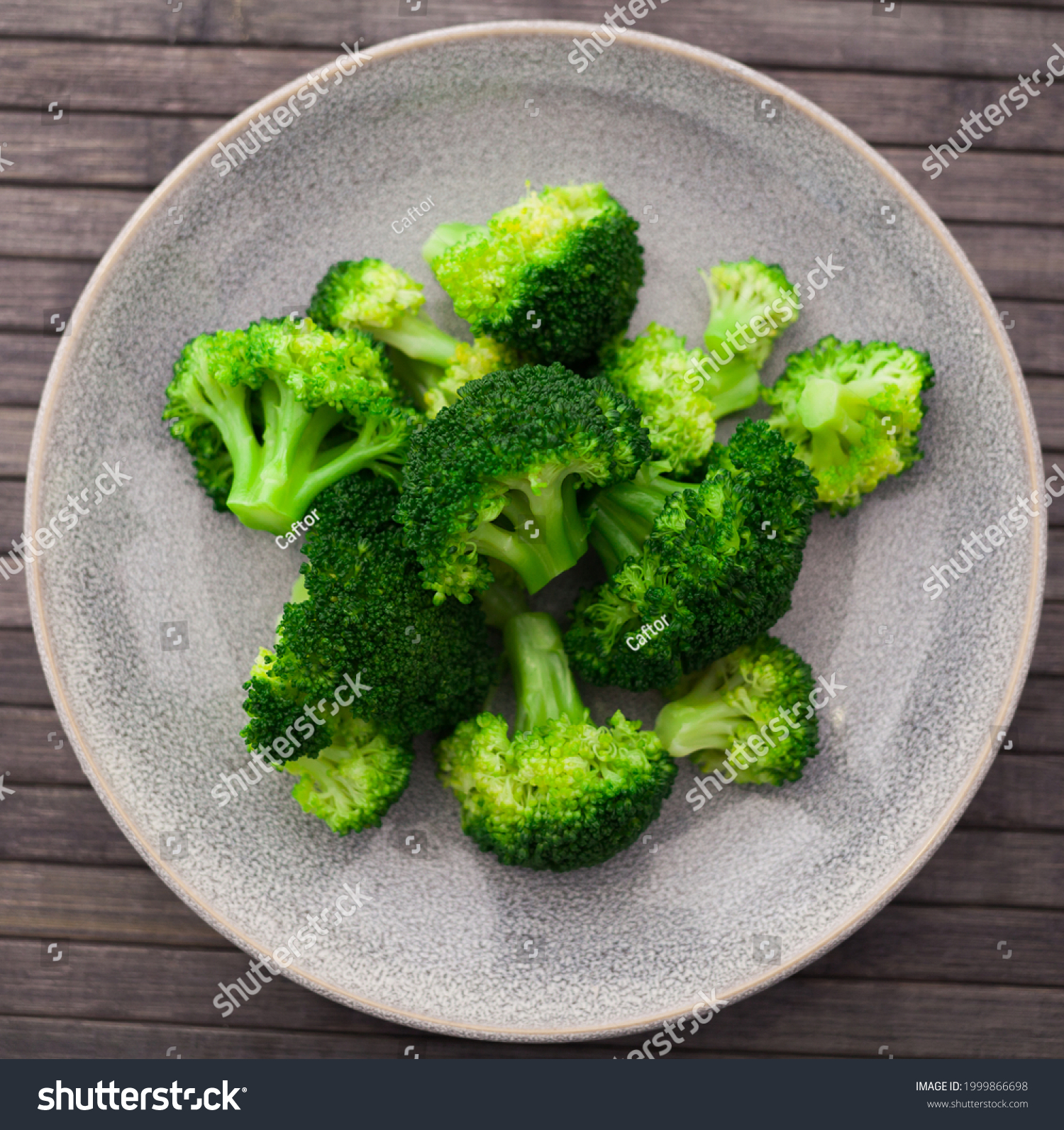 boiled broccoli inflorescences in plate