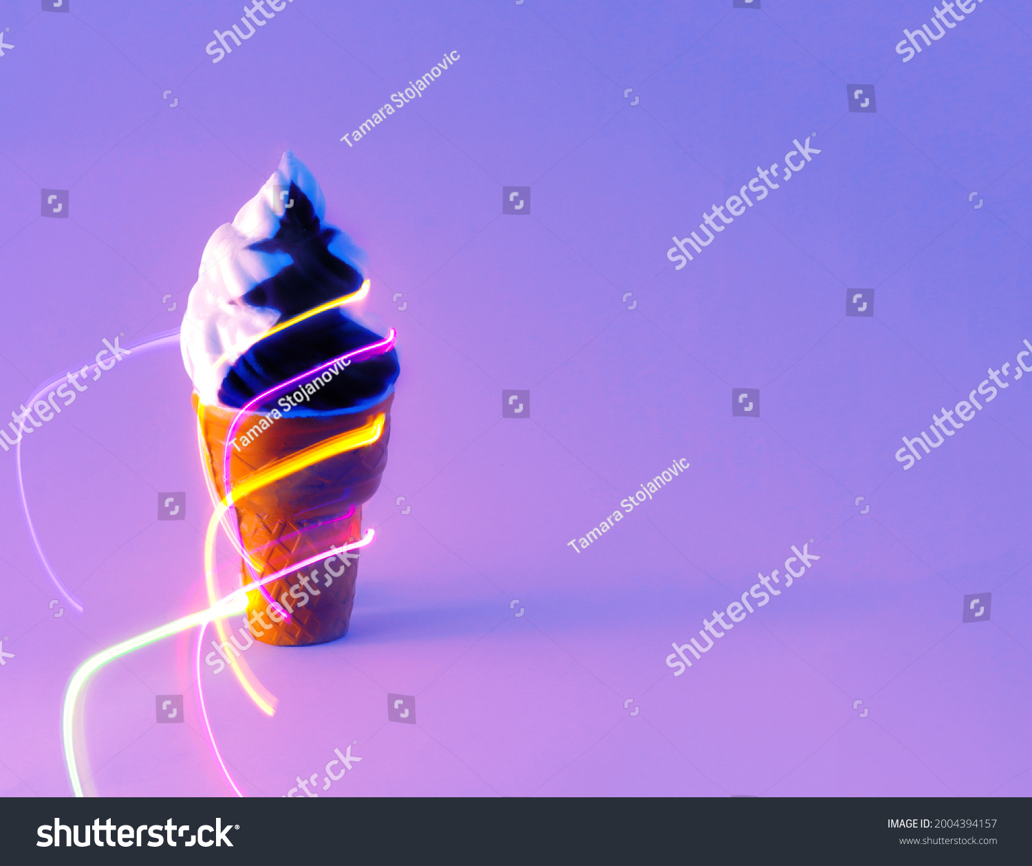 Chocolate ice cream with neon lantern lines. Summer party. Minimal aesthetics.