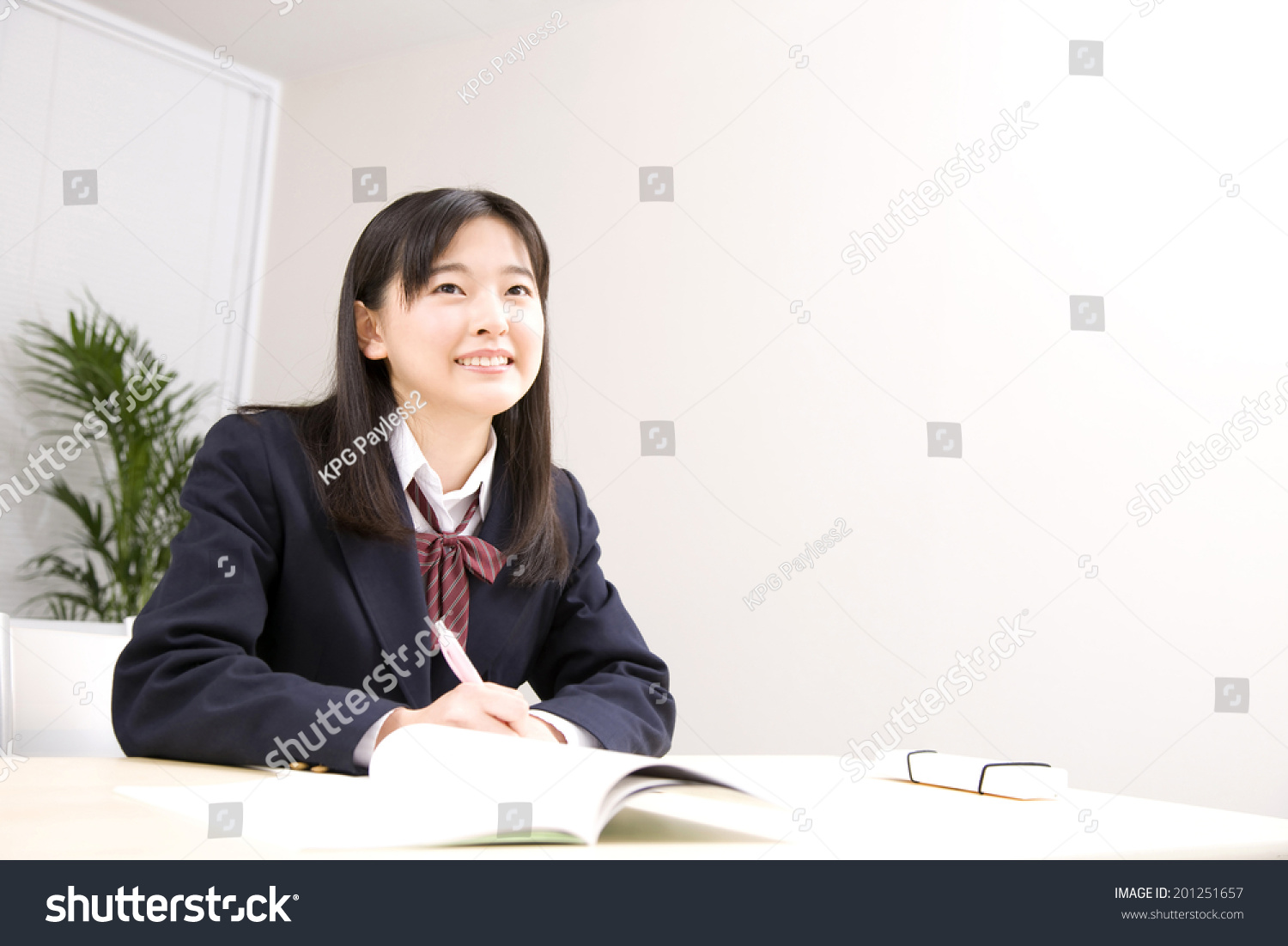 A middle school girl studying at school