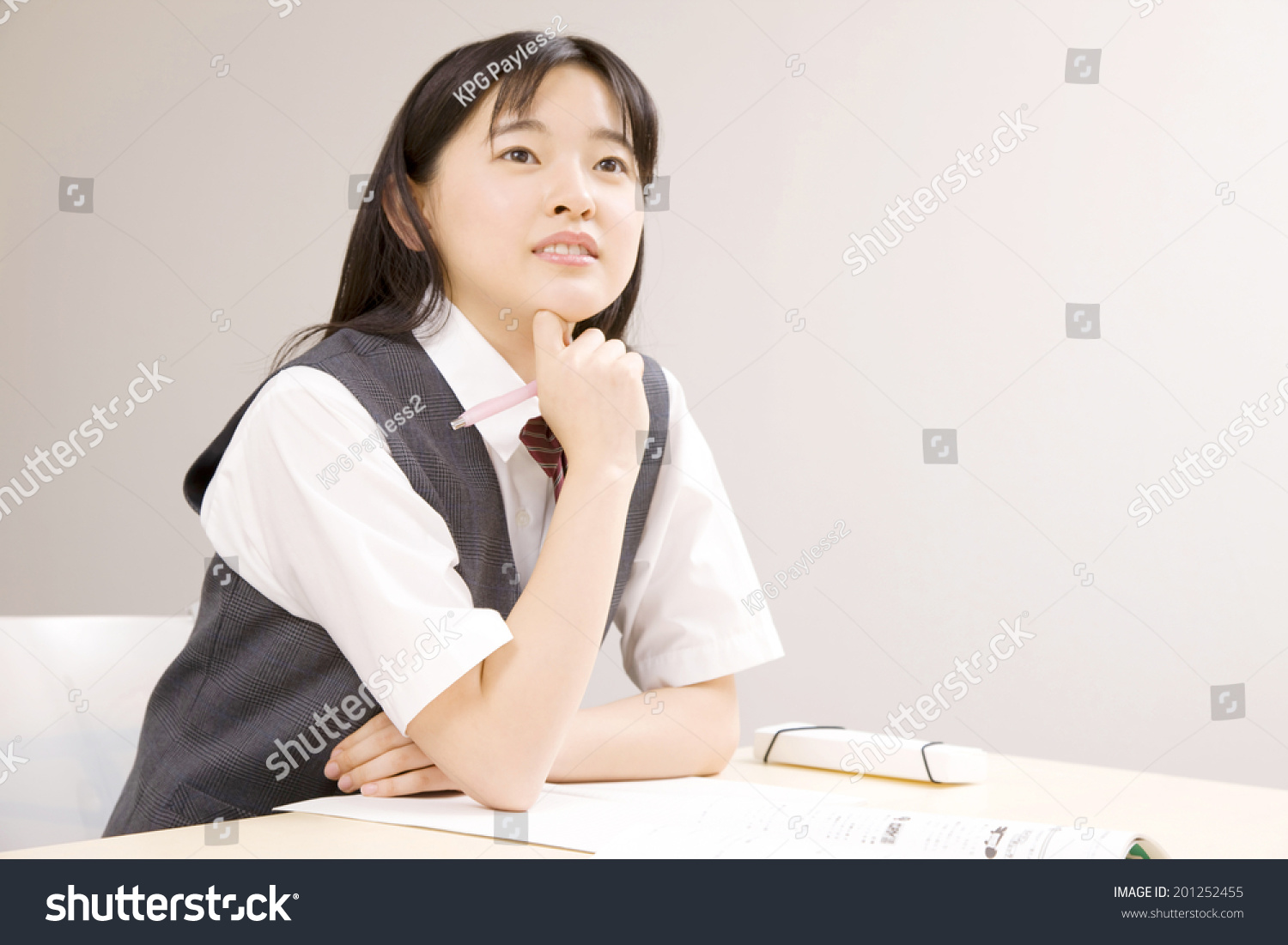 A middle school girl studying at school