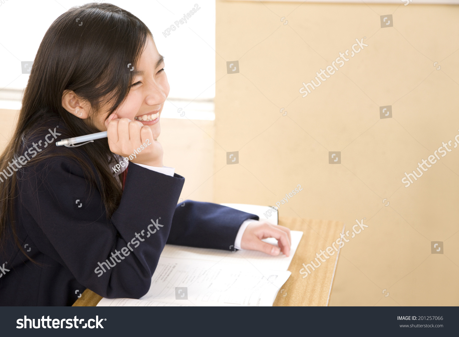 A middle school girl taking a class