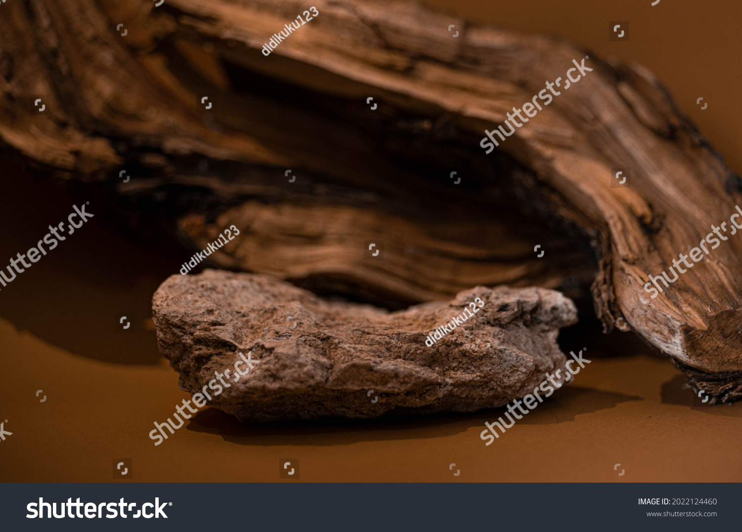 Natural concept light stone with a background of wood.