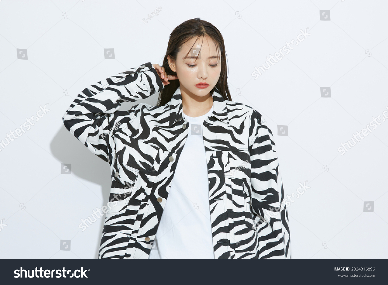 Portrait of fashionable young Asian woman