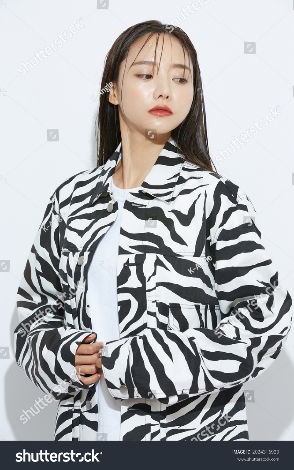 Portrait of fashionable young Asian woman