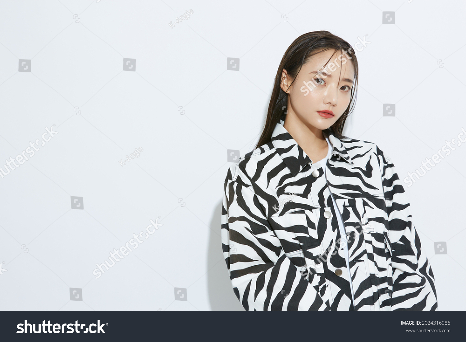 Portrait of fashionable young Asian woman