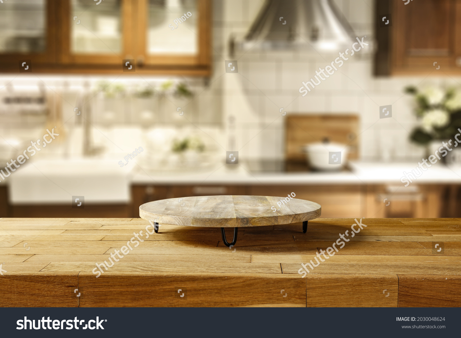 Wooden desk of free space and kitchen interior. Pedestal for your product. 
